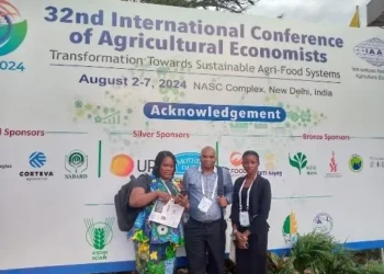Dr Osabohien (middle) with Dr Olarinde (left) and Dr Jacob (right) at the 32nd International Conference of Agricultural Economists, New Delhi, India